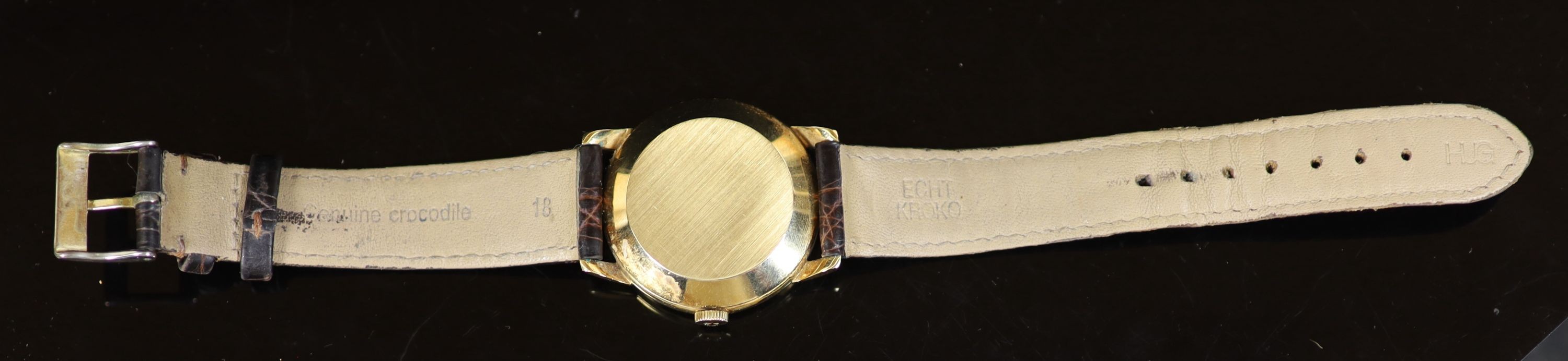 A gentleman's late 1950's 14ct gold Omega manual wind wrist watch